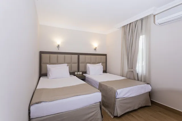 جناح اقتصادي بسرير مزدوج أو سريرين منفصلين، Moonshine Hotel and Suites 1/5