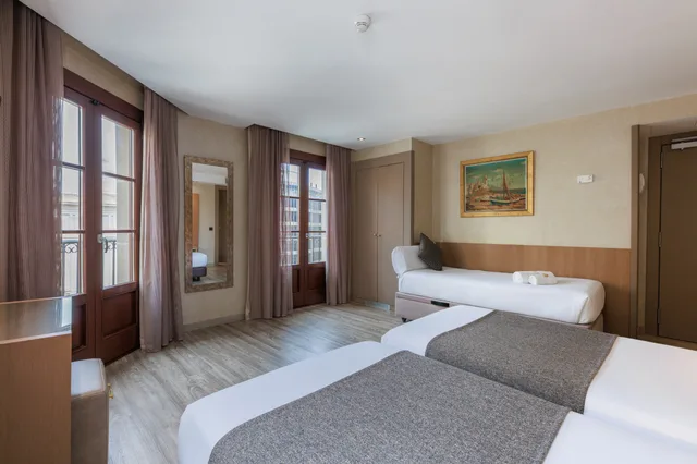 غرفة ثلاثية مفردة، Hotel Suizo 5/9