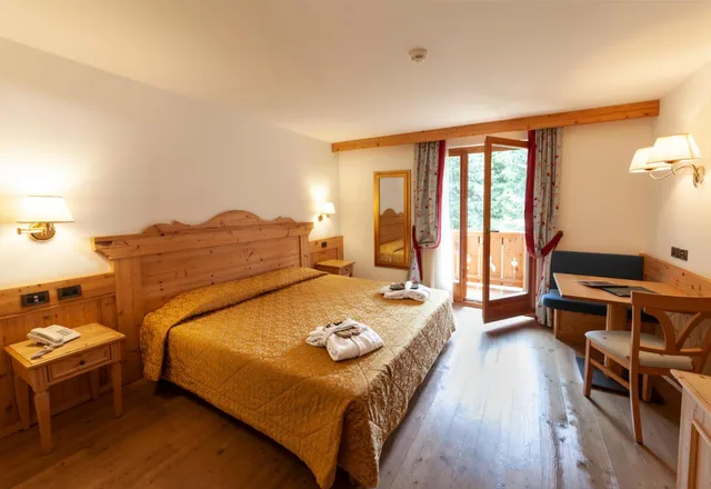 غرفة قياسية بسرير مزدوج أو سريرين منفصلين بإطلالة على الحديقة، Campiglio Bellavista 1/7
