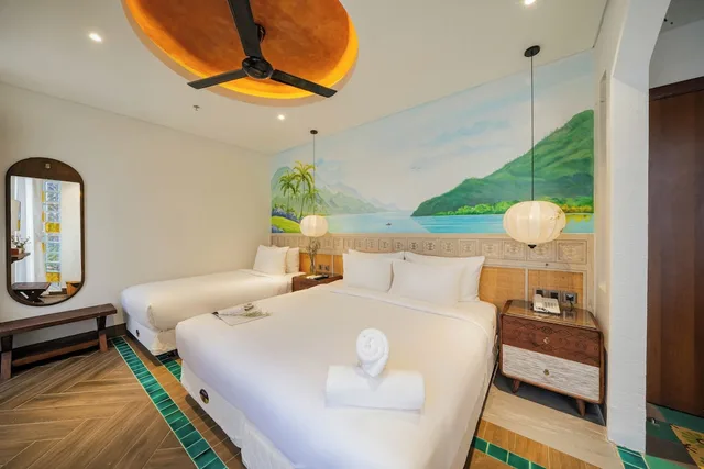 غرفة عائلية بسرير كينج وسرير فردي بشرفة، Seahorse Signature Danang Hotel by Haviland 1/3