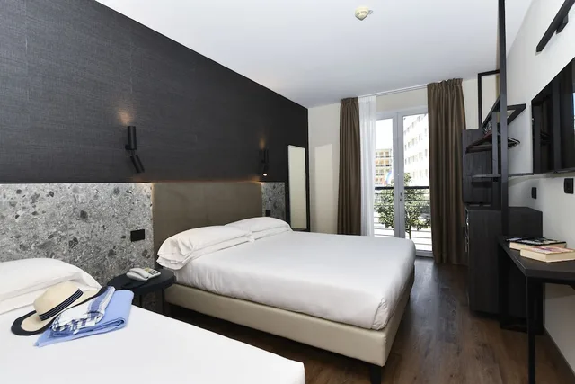 غرفة سوبيريور ثلاثية بسرير مزدوج وسرير فردي، Hotel Eden 1/4