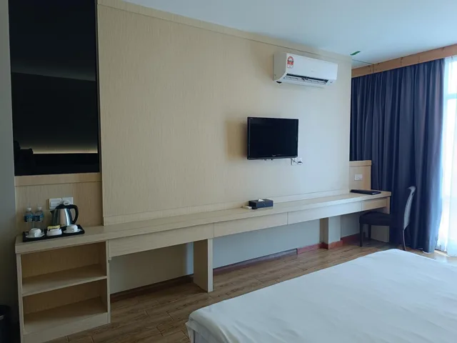 غرفة ديلوكس بسرير كينج، Lintas Platinum Hotel 4/6