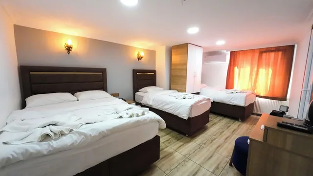 غرفة اقتصادية رباعية بسرير مزدوج وسريرين منفصلين بغرفة نوم واحدة، Laos Otel 6/10