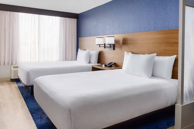 غرفة بسريرين كوين مع أريكة، Hyatt Place Orlando / I-Drive / Convention Center 1/7