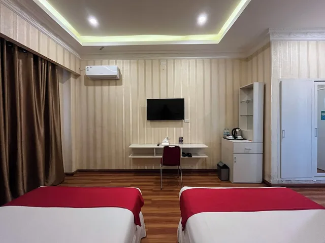 غرفة قياسية بسريرين منفصلين، Grand Tamaro Hotel Parapat 5/6