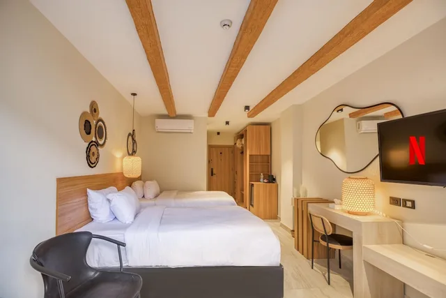 Deluxe Twin Room with Pyramids View، La Boutique Hotel - Vue Des Pyramides 2/4