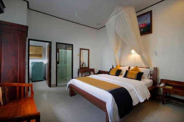 جناح بسرير كينج بغرفة نوم واحدة بمطبخ صغير، Hotel Jati And Home Stay 4/10
