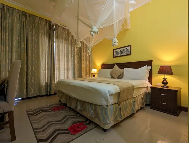 غرفة قياسية بسرير كينج بشرفة، Mvuli Hotel 1/9