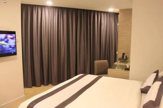 غرفة ديلوكس ثلاثية بسرير كينج وسرير فردي، NU Hotel KL Sentral 1/2