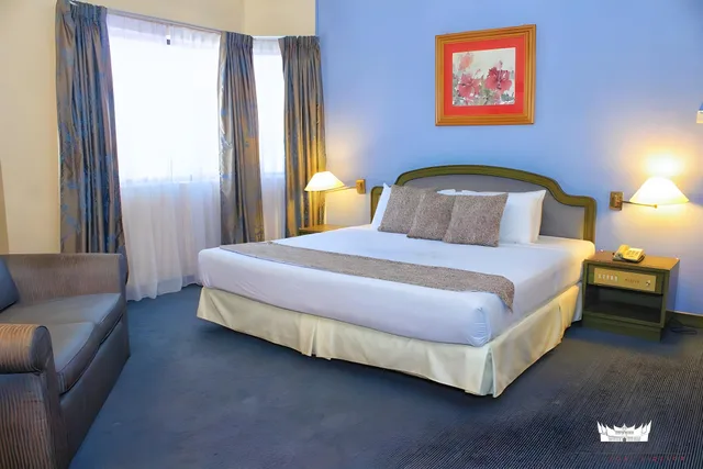 غرفة ديلوكس بسرير كينج، THE GRAND BEACH RESORT PORT DICKSON 1/2