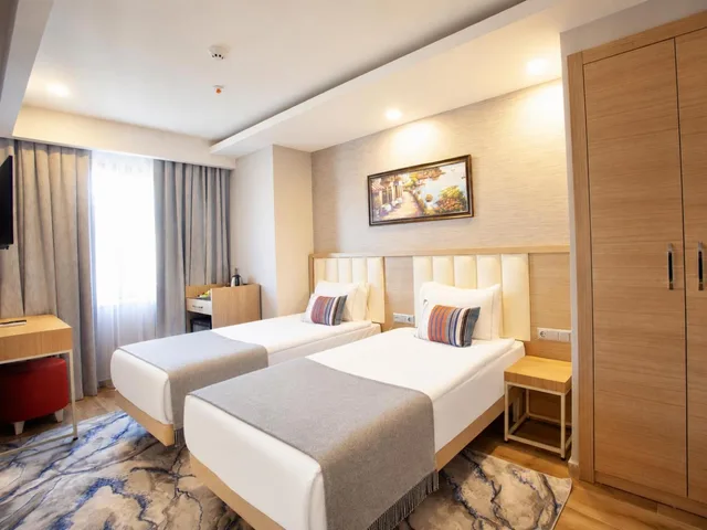 جناح عائلي ديلوكس بسرير مزدوج وسريرين منفصلين، Old Town Point Hotel & Spa Antalya 1/7