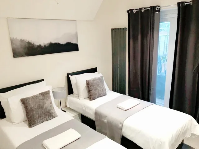 غرفة ديلوكس بسريرين منفصلين بإطلالة على الحديقة بحمام مشترك، Cogie House 1/1