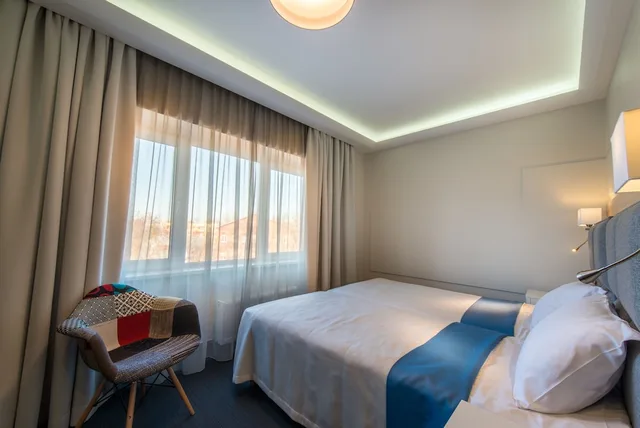 غرفة قياسية بسرير كوين، Amrita Hotel 1/8