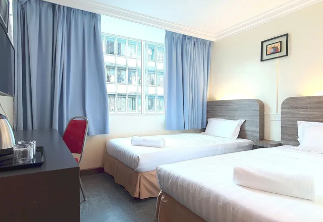 غرفة ديلوكس بسريرين منفصلين، Capital O 90939 Sandakan Central Hotel 2/5