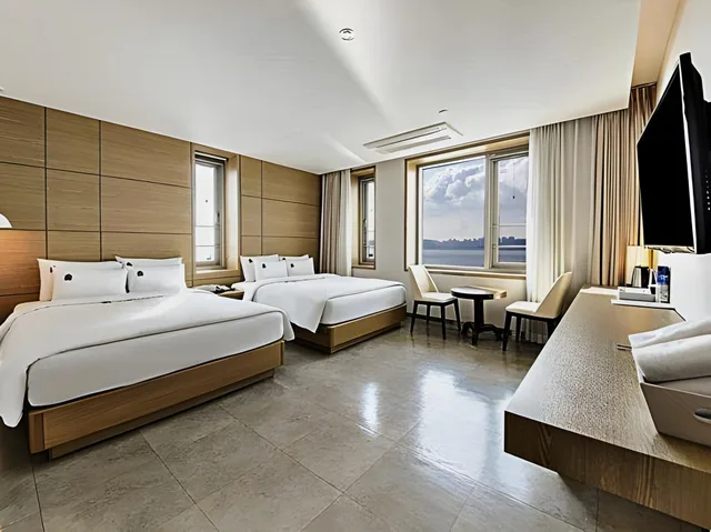 غرفة قياسية بسريرين منفصلين بإطلالة على البحر، Benikea The Bliss Hotel 2/2