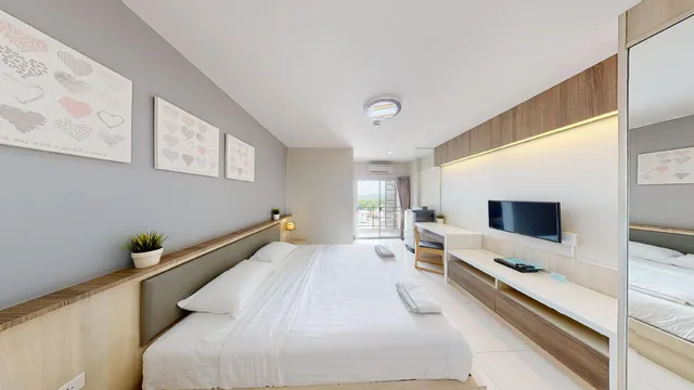 غرفة قياسية بسرير كينج بإطلالة على البحر، Central Place Serviced Apartment Angsila 1/1