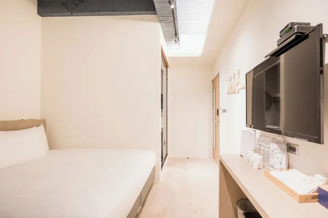 غرفة أساسية ثلاثية بسرير مزدوج وسرير فردي، Traveller-Inn Tiehua Light Spot Hotel 4/4