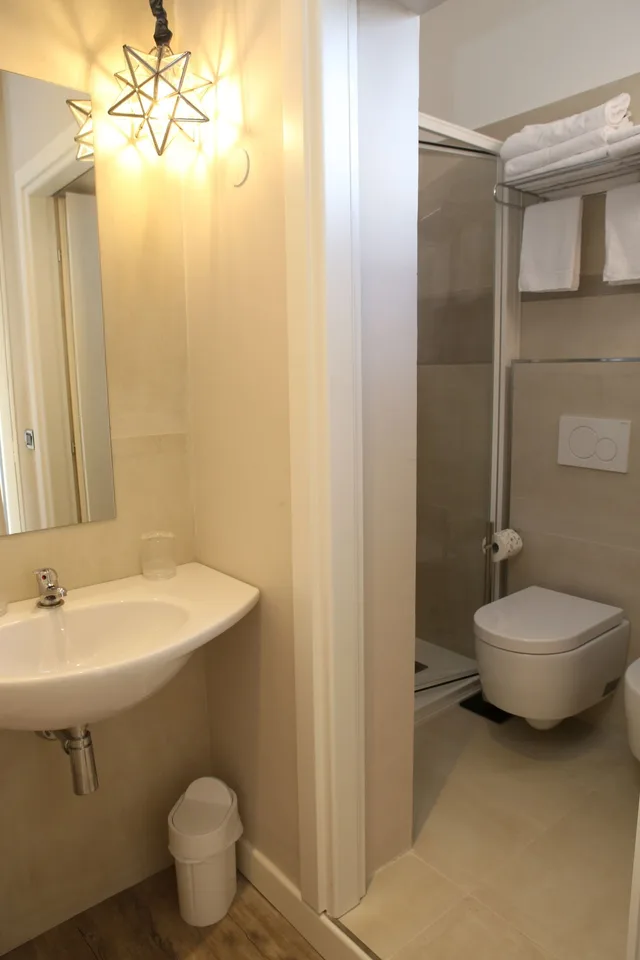 غرفة سوبيريور ثلاثية بسرير مزدوج وسرير فردي، Hotel Piccinelli 4/5