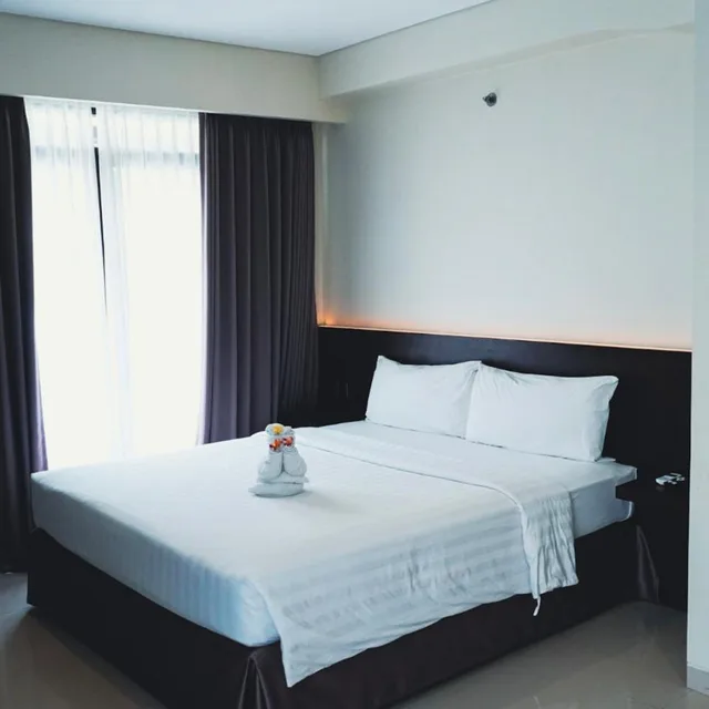 غرفة ديلوكس بسرير مزدوج أو سريرين منفصلين، Grand Kuta Hotel Residence 1/10