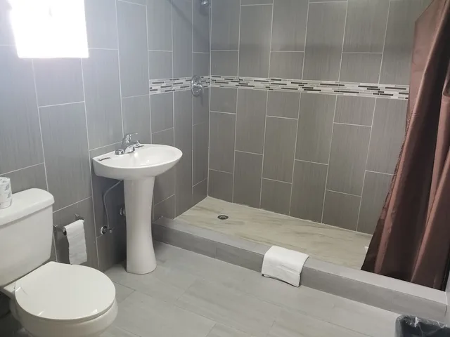 غرفة مفردة بسرير مزدوج، sunny south motel 5/5