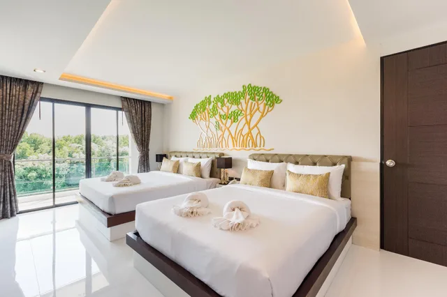 غرفة ديلوكس عائلية بسرير كينج وسرير كوين بشرفة، River Front Krabi Hotel 1/1