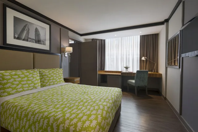 غرفة عائلية بسرير كينج وسرير كوين بغرفتي نوم، Melia Kuala Lumpur 1/2