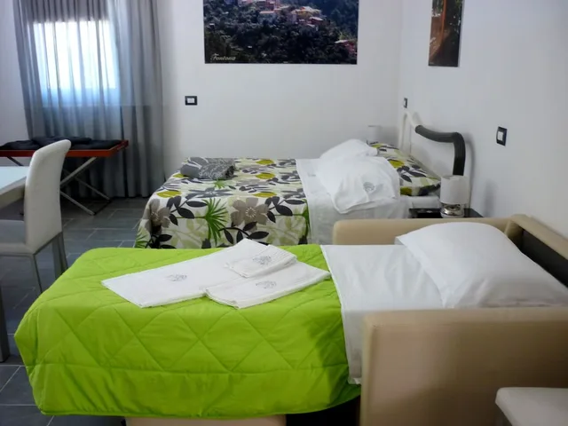 استوديو بسرير كوين وسرير فردي بغرفة نوم واحدة بمطبخ صغير، Resort Costa Morroni 4/6