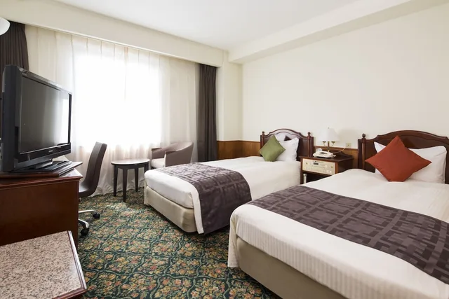 غرفة مفردة بسريرين منفصلين للمدخنين، Premier Hotel Cabin Obihiro 1/4