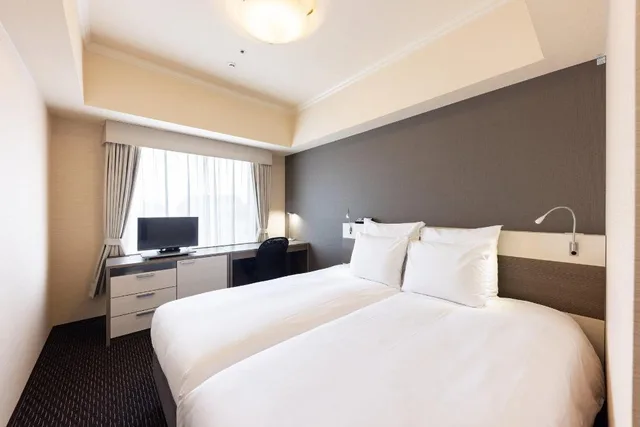 غرفة قياسية بسريرين منفصلين للمدخنين، Ana Crowne Plaza Hotel Toyama 1/2