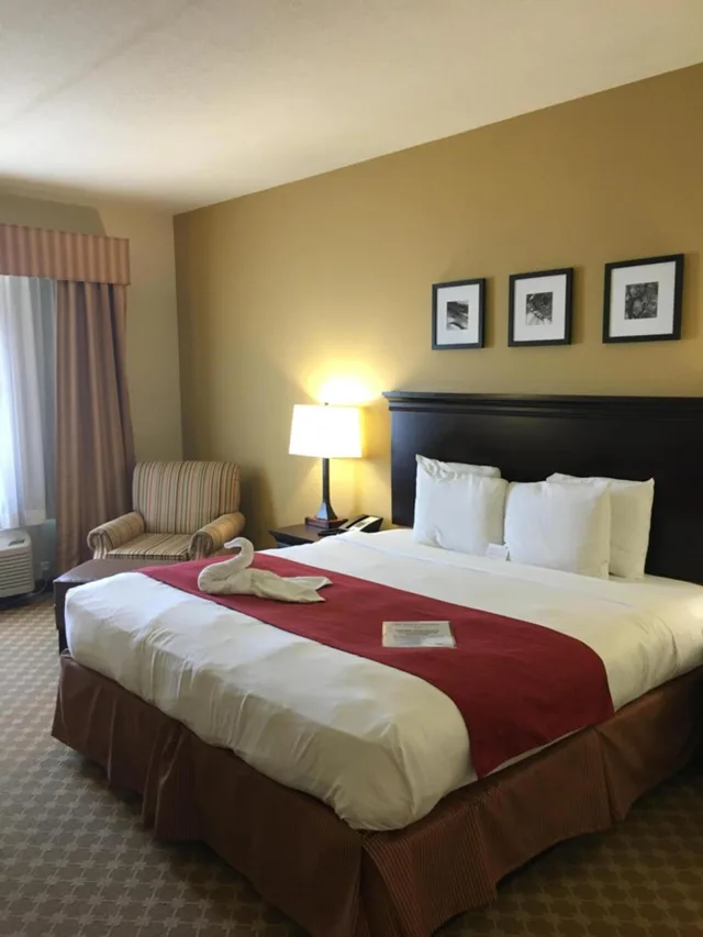 جناح بسرير كينج مع أريكة، Country Inn & Suites by Radisson, Port Orange-Daytona, FL 2/4