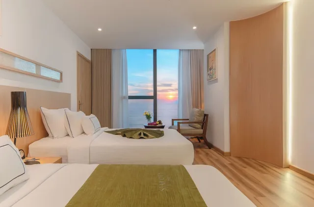 غرفة متصلة عائلية بسرير كينج وسريرين منفصلين بإطلالة على البحر، Starcity Bayfront Nha Trang Hotel 3/10