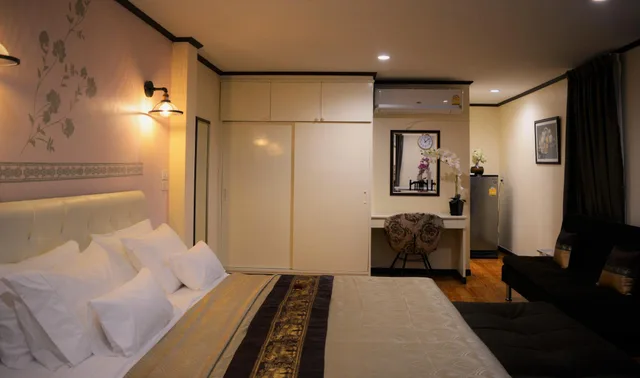 غرفة بريميير ديلوكس بسرير كوين وسرير فردي، Cana Boutique Hotel 1/2