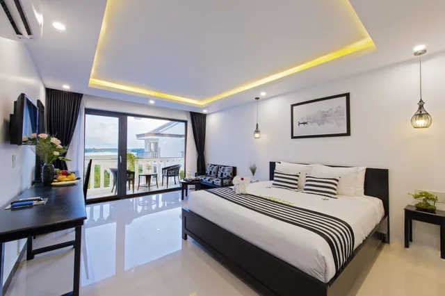 غرفة ديلوكس بسريرين منفصلين بشرفة، Gem Riverside Hotel Hoi An 2/10