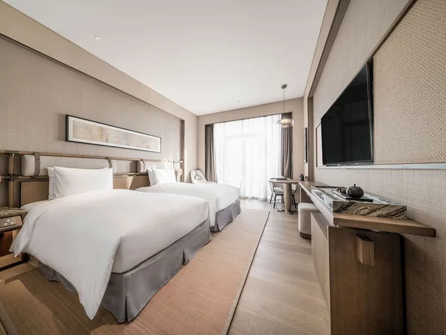 غرفة ديلوكس بسريرين منفصلين بإطلالة على الحديقة، Ocean Spring Resort Chengdu - MGallery Collection 1/3