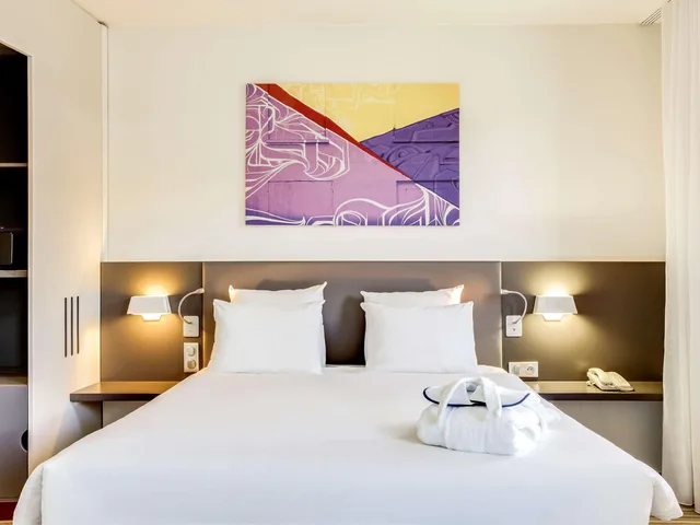 جناح تنفيذي بسرير مزدوج مع أريكة، Novotel Suites Paris Stade De France 2/10