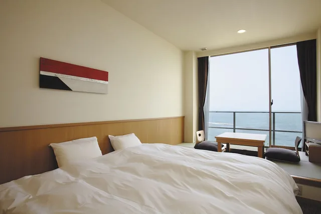 غرفة يابانية بسرير كينج بإطلالة على البحر، Bayside Square Kaike Hotel 1/1