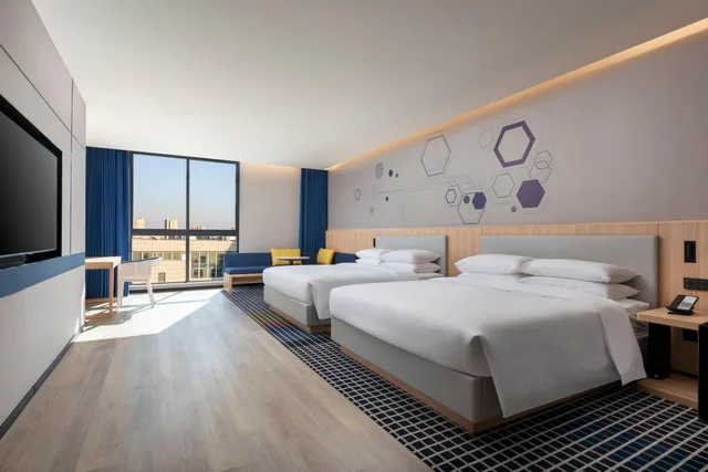 غرفة ديلوكس بسريرين كينج، Microtel by Wyndham Taicang Shaxi 1/1