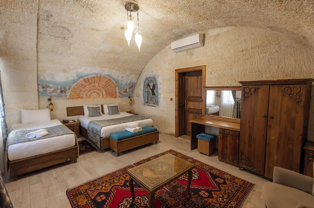 غرفة كومفورت بسرير كوين وسرير فردي، Grand Cappadocia Hotel 1/8