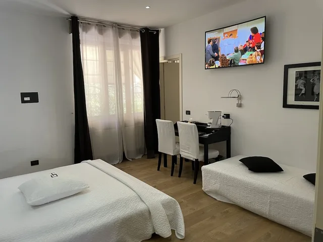 غرفة بزنس ثلاثية بسرير كوين وسرير فردي، Gardenia Hotel 1/6