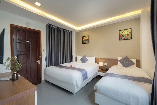 Mega, Triple, 1 Queen and 1 Single Bed، Stop And Go Boutique Homestay In Hue 5/7