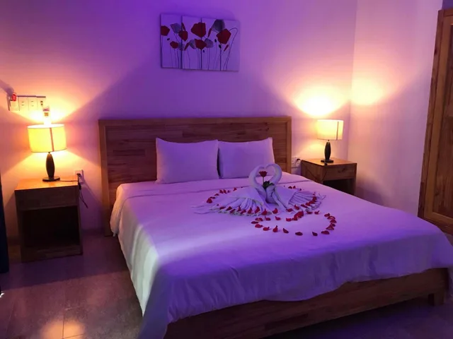 غرفة ديلوكس بسرير كوين بشرفة، Tran Family Villas Boutique Hotel 5/7