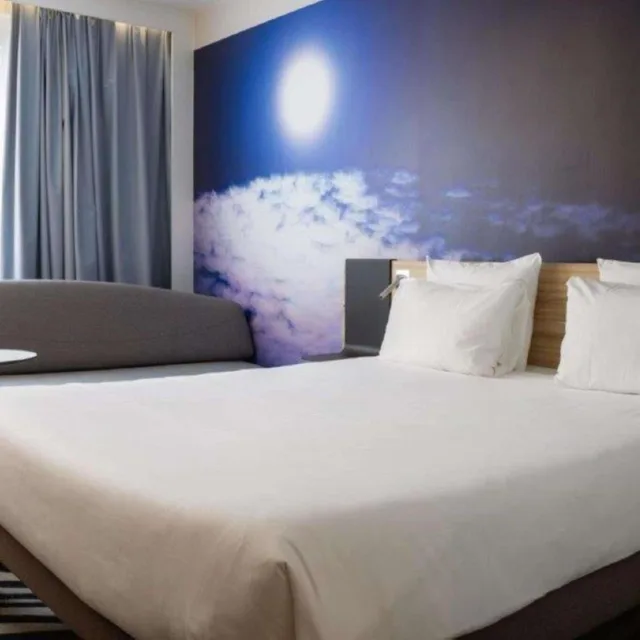 غرفة عائلية بسرير مزدوج وسرير فردي مع أريكة، Novotel Valence Sud 2/7