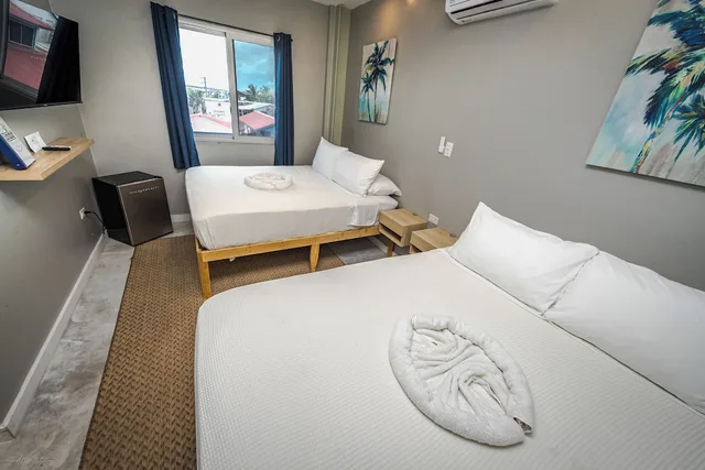 غرفة ديلوكس بسريرين كوين، Sandbar Beachfront Hostel And Restaurant 1/5