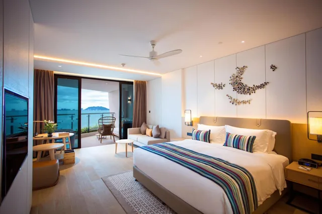غرفة بسرير كينج بإطلالة على البحر، Sanya Conifer Resort 3/5