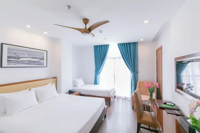Deluxe, Triple, 1 King and 1 Single Beds, City View, Pool Access، Ritzy Boutique Hotel Da Nang 3/10