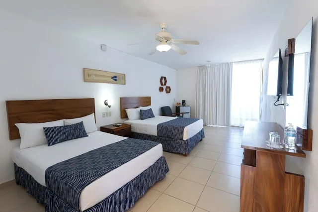 غرفة بريميوم بسريرين مزدوجين بإطلالة على البحر، Costa Alegre Hotel And Suites 1/4