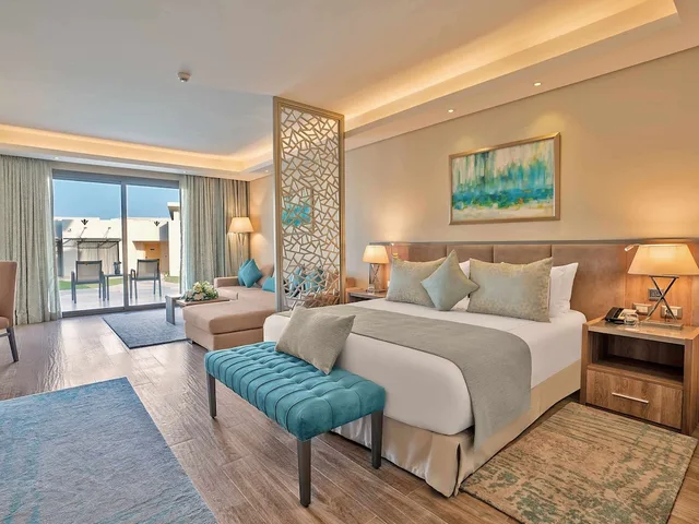 جناح بسرير كينج بإطلالة على الحديقة مع أريكة، Rixos Premium Magawish Bay View 2/6