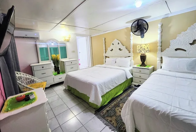 Family, 1 Single and 2 Queen Beds, Pool Access, Pinkhibiscus Guest House 6/10