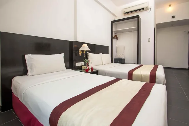 غرفة ديلوكس ثلاثية بسرير مزدوج وسرير فردي بإطلالة على المدينة، Swan Garden Hotel 1/1