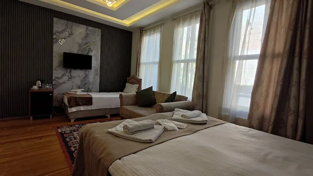 غرفة قياسية ثلاثية بسرير كوين وسرير فردي، Nuray Hotel 2/10